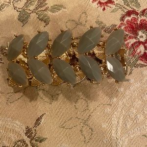 Green elastic stretch bracelet.